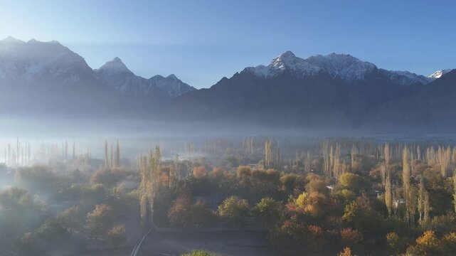 Vibrant aerial view of Hunza Valley, during autumn. Among the rocky mountains. Pakistan