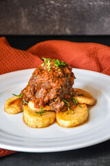 homemade recipe of meat with potatoes, oxtail with sauce. 