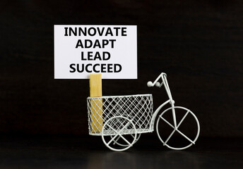 Innovate adapt lead succeed symbol. Concept words Innovate Adapt Lead Succeed on beautiful white...