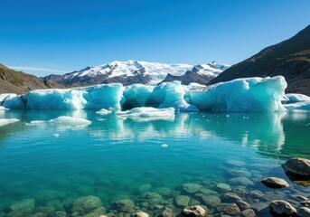 Pristine glacial lake, turquoise water, floating icebergs, snow-capped mountains, rugged shoreline, clear blue sky, reflection on water surface, serene wilderness, Alaska landscape, panoramic view, cr