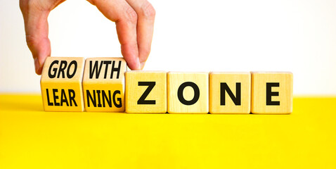 Learning or growth zone symbol. Concept words Learning zone Growth zone on wooden cubes. Beautiful yellow table white background. Psychologist hand. Business learning growth zone concept. Copy space.