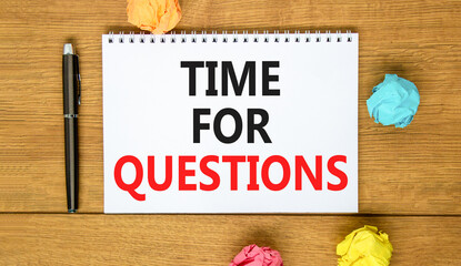 Time for questions symbol. Concept words Time for questions on beautiful white note. Beautiful wooden background. Black pen. Colored paper. Business time for questions concept. Copy space.