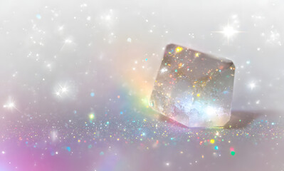 Rainbow light and white dust in Png format. The crystal shimmers with a rainbow effect. Png Background with bokeh light effect. PNG Gorgeous Christmas glowing background made of dust and confetti.