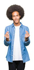 Young african american man with afro hair Doing money gesture with hand, asking for salary payment,...