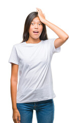 Fototapeta premium Young asian woman over isolated background surprised with hand on head for mistake, remember error. Forgot, bad memory concept.