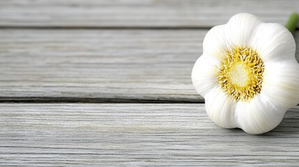 Obraz premium A close up of a garlic bulb on a wooden table