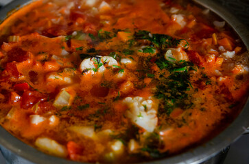 Russian tomato vegetable soup with cauliflower