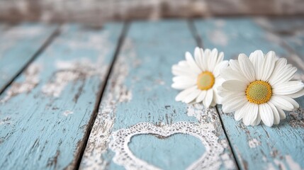 Obraz premium Two white daisies sitting on top of a wooden table