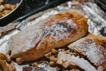 apple pie with powdered sugar