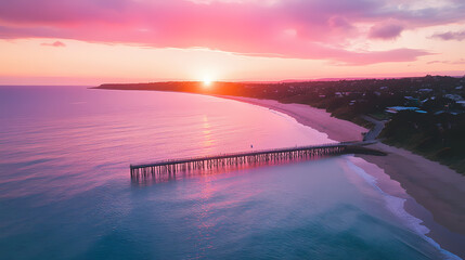 Obraz premium Aerial sunset over mornington peninsula coastline and pier in melbourne, victoria. Morningtide. Illustration
