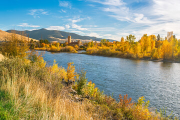 Panoramic view from the Riverfront Trail along the Clark Fork River of the University District and tower of the Boone Crockett Club Natural History Museum in downtown Missoula, Montana.	