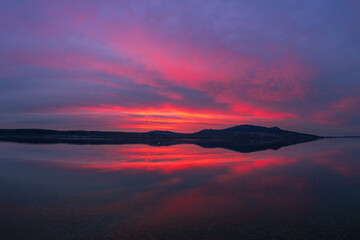 Beautiful colorful sky over the lake at sunset. Musov and view of the Palava landscape