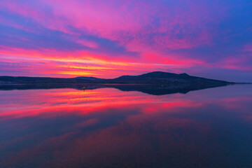 Beautiful colorful sky over the lake at sunset. Musov and view of the Palava landscape
