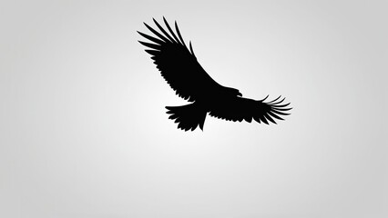 Obraz premium Silhouette of a flying eagle, symbolizing strength and freedom in minimalist design.
