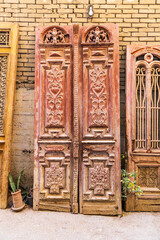 Old Cairo, Cairo, Egypt. Antique wooden doors in an alley in Cairo.