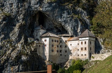 Predjama Castle carved in the rock. Amazing construction in Slovenia