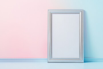 Elegant empty frame rests against pastel pink and blue walls in a serene artistic space