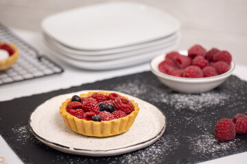 baked goods, berry tart with raspberries