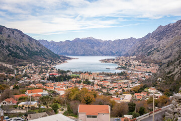 Obraz premium Panoramic view of Kotor town and Bay Boca from mountain view point in Montenegro in winter time