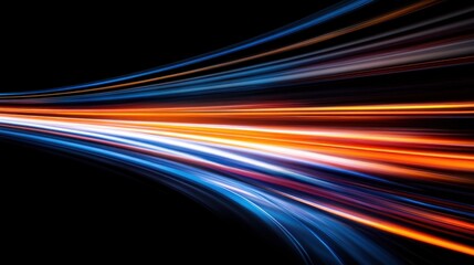 Colorful light trails stretch across a dark background, creating fluid and energetic patterns that evoke a sense of motion and excitement during a nighttime photography event