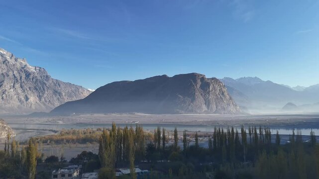 Vibrant aerial view of Hunza Valley, during autumn. Among the rocky mountains. Pakistan