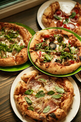 Delicious assortment of pizzas with various toppings, perfect for sharing and pizza night gatherings