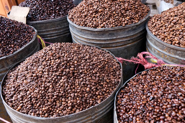 Marrakech, Morocco. Bins of coffee beans for sale in the medina