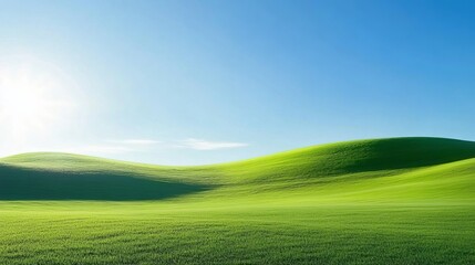 Fototapeta premium Tranquil green hills under clear blue sky horizon