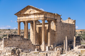 Obraz premium Dougga, Beja, Tunisia. The Capitol Temple at the Roman ruins.