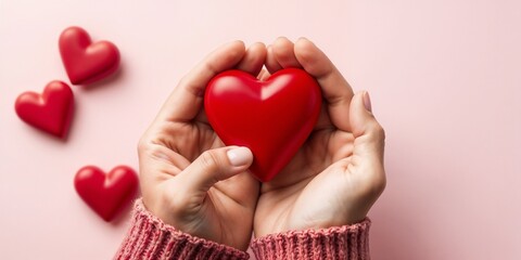 Fototapeta premium Heart in Hands: Symbol of Love and Care