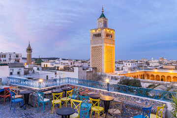 Medina, Tunis, Tunisia. Rooftop cafe overlooking the Great Mosque in the Medina of Tunis.