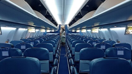  interior of passenger cabin of commercial aircraf