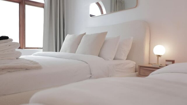 Elegant hotel rooms with two beds with fine and luxurious finishes for guests