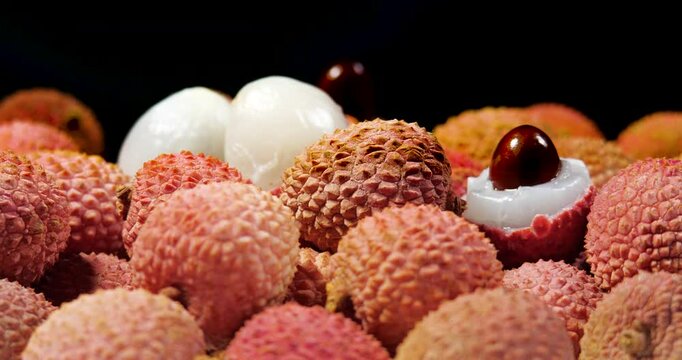 Lychee Exotic Fruit Rotating Background. Harvested Litchi Fruits or Berries. Asian food