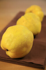 Freshly harvested quinces on the table