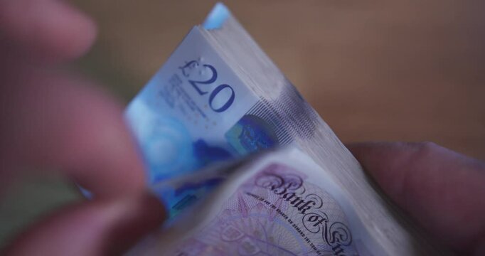 Counting British &pound;20 Banknotes in Slow Motion &ndash; 4K Close-Up