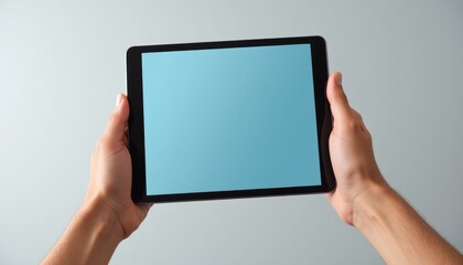 Realistic tablet mockup being held by a hand, displaying the screen with a clean, neutral background and soft lighting