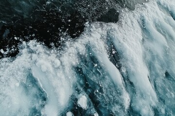 Ice formations create a stunning contrast against dark waters, showcasing nature's breathtaking beauty at twilight