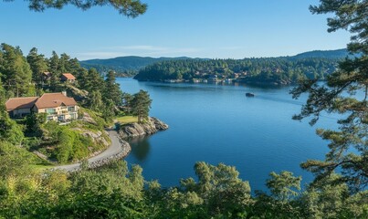 Scenic view of fjord surrounded by greenery and waterfront homes.