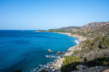The beautiful beach of Porto Sa Ruxi in Sardinia with white sand and transparent blue and turquoise...