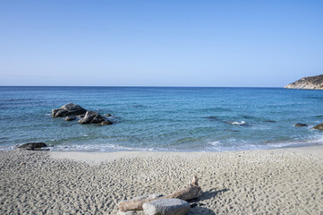 The beautiful beach of Porto Sa Ruxi in Sardinia with white sand and transparent blue and turquoise...