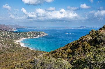 Fototapeta premium Aerial view of the beautiful beach of Porto Sa Ruxi in Sardinia with white sand and transparent blue and turquoise water