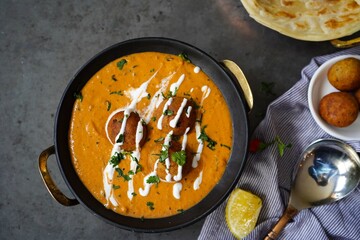 Malai Kofta served with Paratha |Indian vegetarian curry with deep fried potato paneer balls