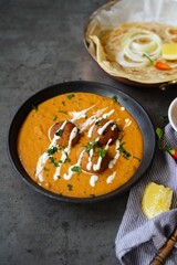 Malai Kofta served with Paratha |Indian vegetarian curry with deep fried potato paneer balls