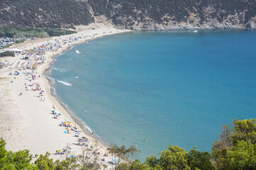 Aerial view of the beautiful Solanas beach with blue and turquoise water