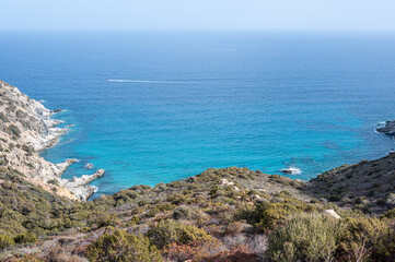 Fototapeta premium Aerial view of the beautiful Cala Sirena with blue and turquoise water