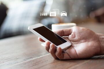 man using EV application on his phone to check charging status.
