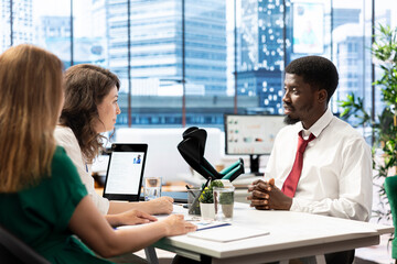 African american person with disability using crutches overcoming challenges, taking advantage of opportunity offered by inclusive and diverse company hiring him, succeeding at work despite setbacks