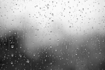 PNG Raindrops on glass surface background droplets texture.