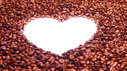 An iconic heart shape carved from a sea of coffee beans on a white backdrop, this image is perfect for expressing love and passion for coffee delicacies.